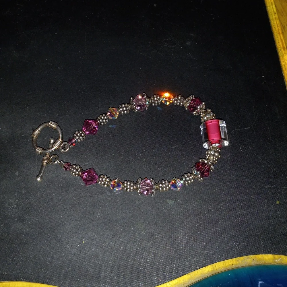 Beautiful handcrafted pinkish red glass and swasvorski crystals beads bracelet